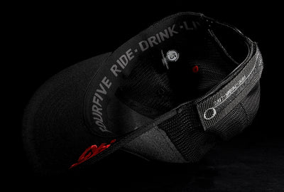 A Fourfive 45 Flat Tracker hat with curved brim in a grey cotton material front flipped over showing the 45 logo embroidery detail on the bottom of the brim and the ride drink live embroidery detail around the sweat band on the inside of the hat.  Built to fit normal and big heads.
